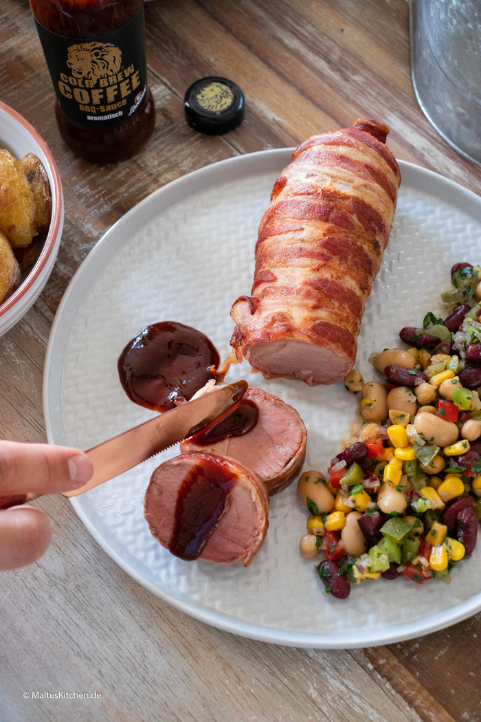 Saftiges rosa gegrilltes Schweinefilet