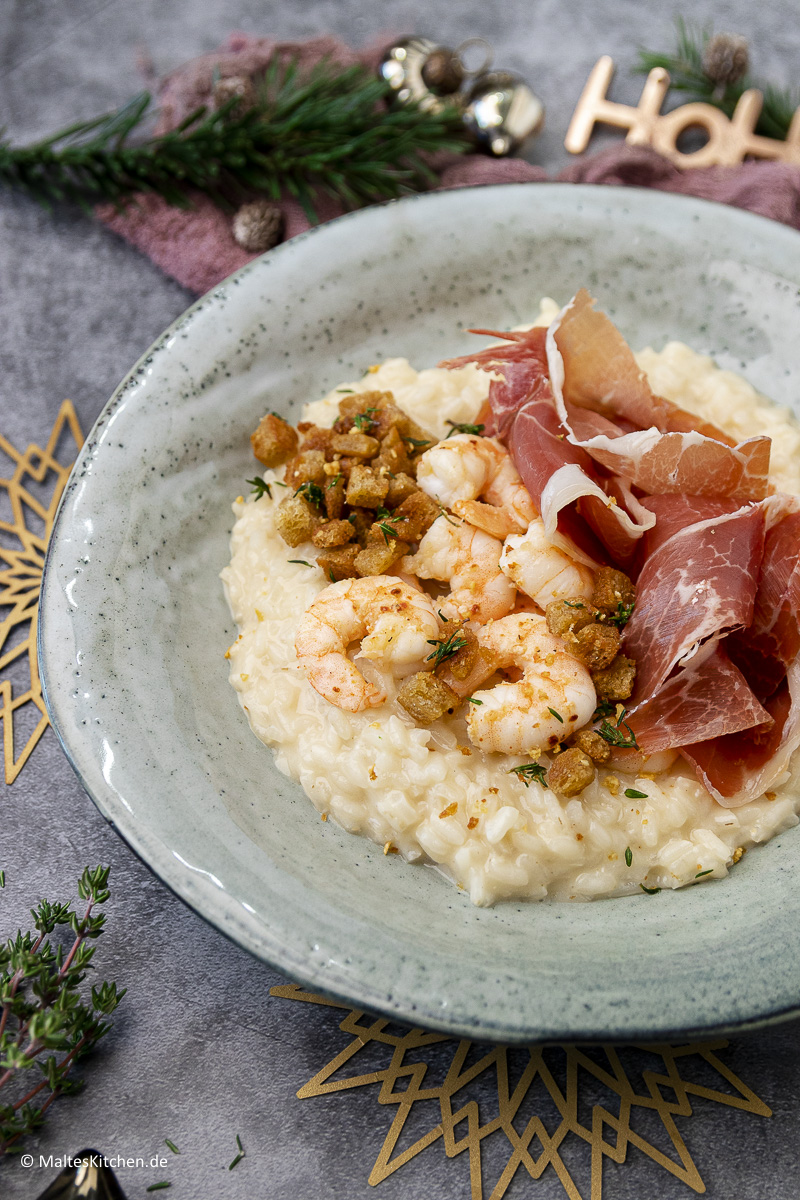 Champagner-Risotto mit Garnelen mit Piri-Piri-Gewürz.