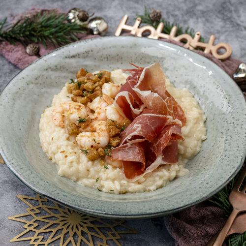 Rezept für ein leckeres Champagner-Risotto mit Garnelen und Serrano-Schinken.