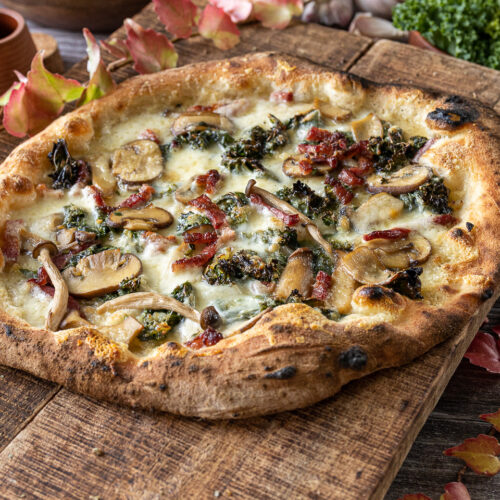 Rezept Pizza mit Grünkohl, Speck und Champignons