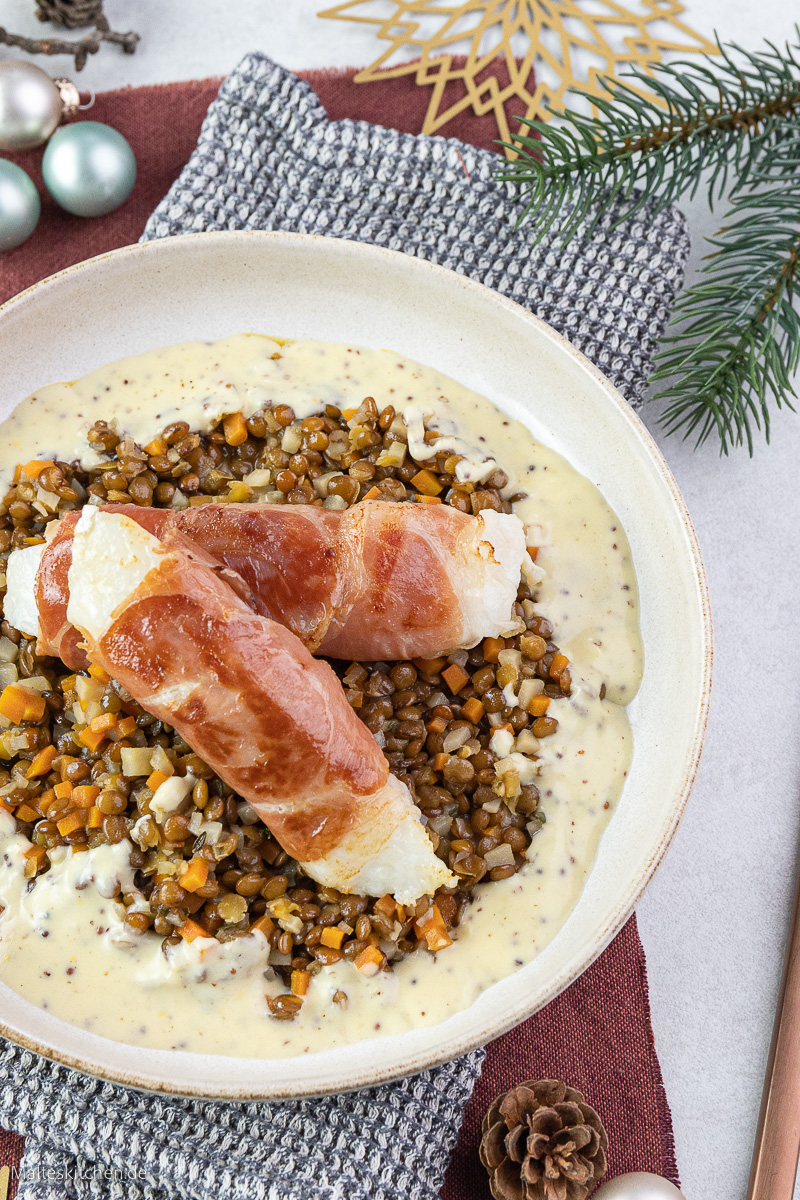 Leckere Fischfilets ummantelt mit Parmaschinken.